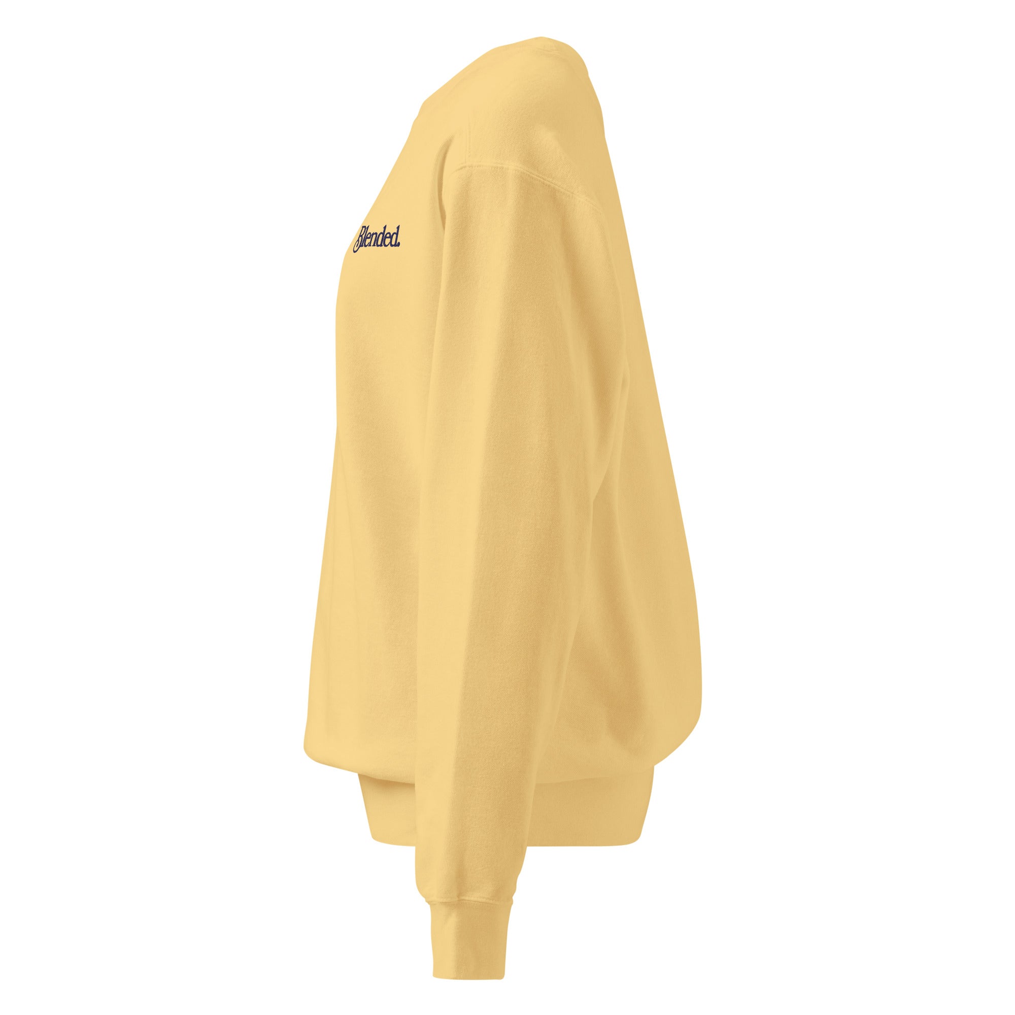 Side view of butter yellow garment-dyed crewneck sweatshirt with navy chest embroidery, relaxed silhouette, bonus mom apparel