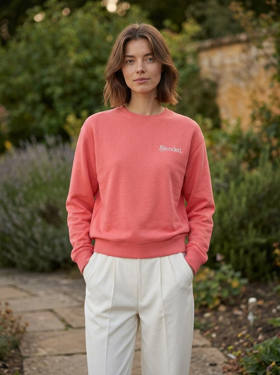 Woman in garden wearing watermelon pink garment-dyed crewneck sweatshirt with chest embroidery -stepmom gift, blended family apparel